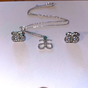 Arbonne logo matching earring and necklace set.
